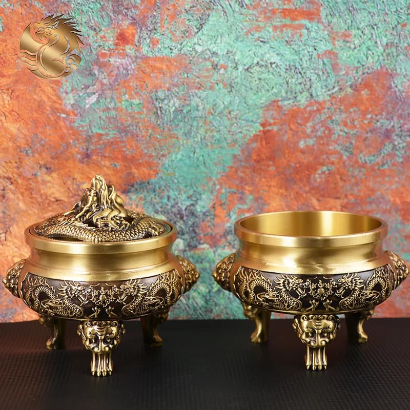 All-brass relief sculpture of two dragons playing with a pearl, a three-legged incense burner, a copper ornament