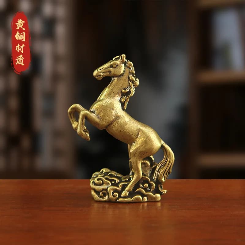 Brass auspicious cloud-patterned warhorse figurine, a creative and unique zodiac design, featuring a horse stepping on aus
