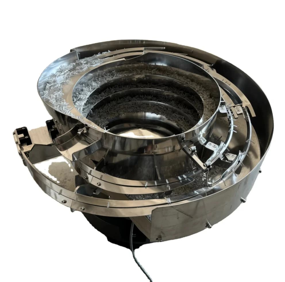 Multi-Outlet Vibratory Bowl Feeder for Distributing Parts to Multiple Assembly Stations