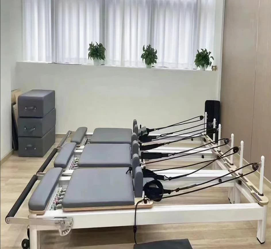 For New Design Pilates Studio Home White Aluminum Alloy Eco-Friendly Commercial Pilates Reformer Machine Wooden Case Packaging