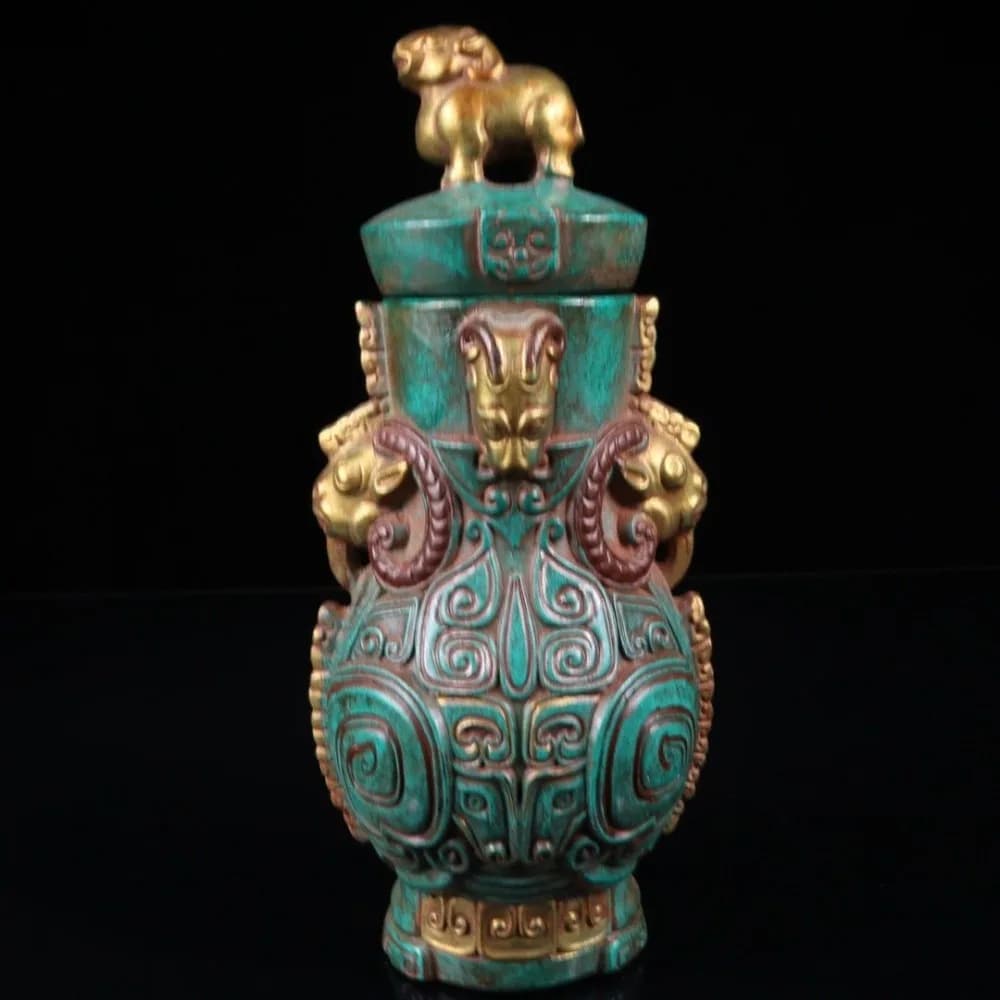 High-glaze Turquoise-colored Jade Vase with Gold-painted Auspicious Beasts, Featuring Intricate Relief Carving and A Rich Patina
