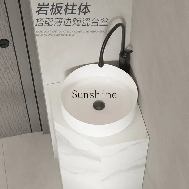 Rock slab triangular column wash basin corner, integrated floor-to-ceiling bathroom balcony corner