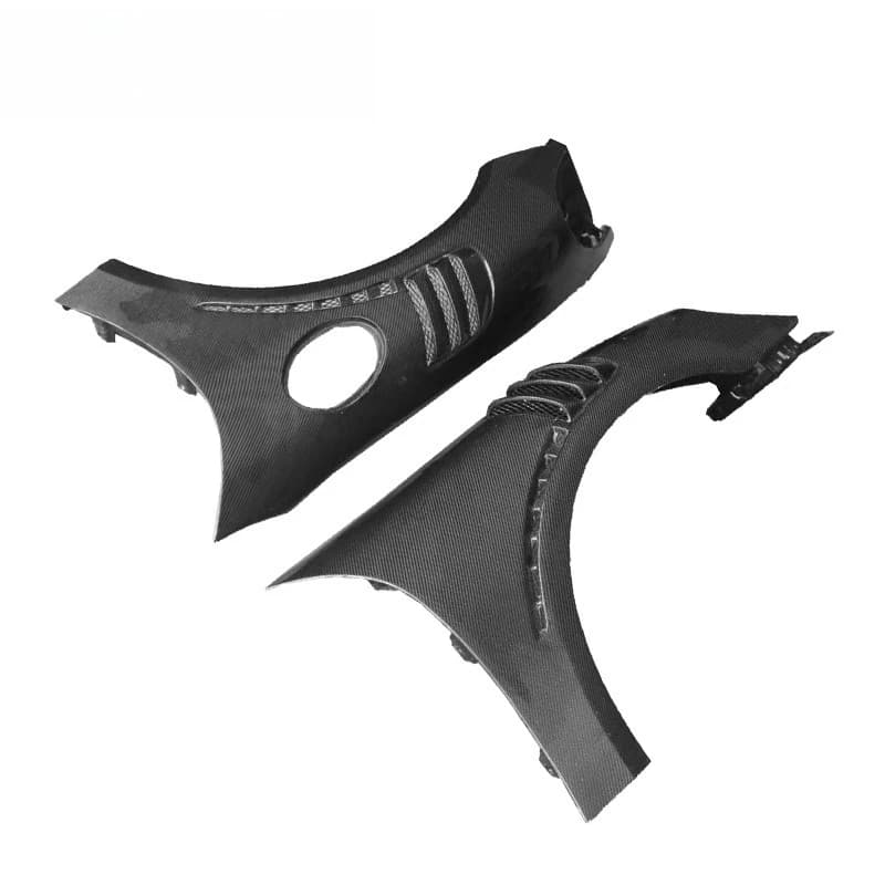 Carbon fiber modified GT4 open-cell fenders surround the car fenders