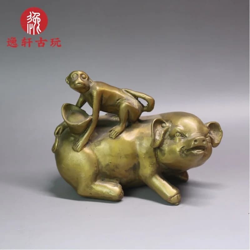 Brass riding a , pure copper pig monkey symbolizing royalty, gift ornament for home and office, antique decorative