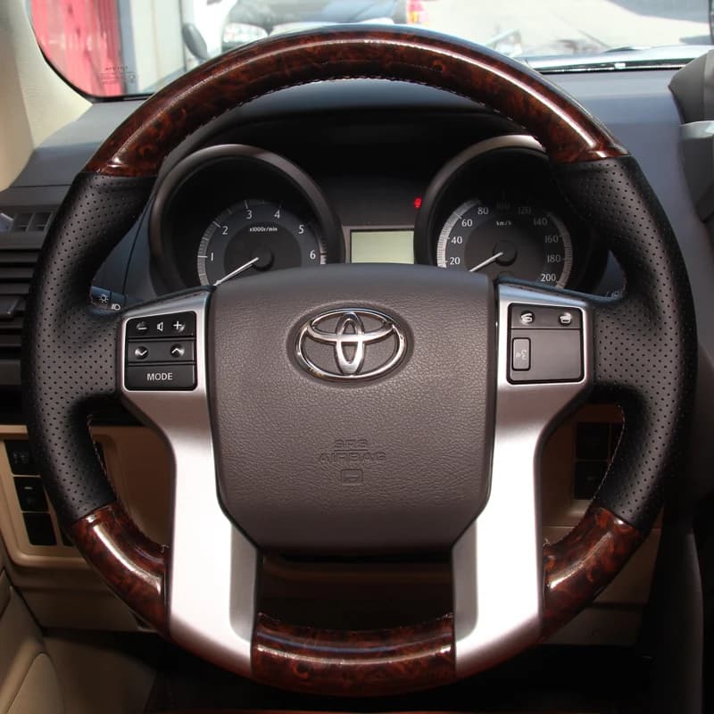 For Toyota Land Cruiser Prado 2010-2017 Hand-stitched Non-slip Black Genuine Leather Peach Wood Grain Car Steering Wheel Cover