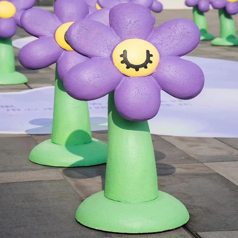 Large purple and yellow laughing flower sculpture with green stems for outdoor garden decoration fiberglass statue