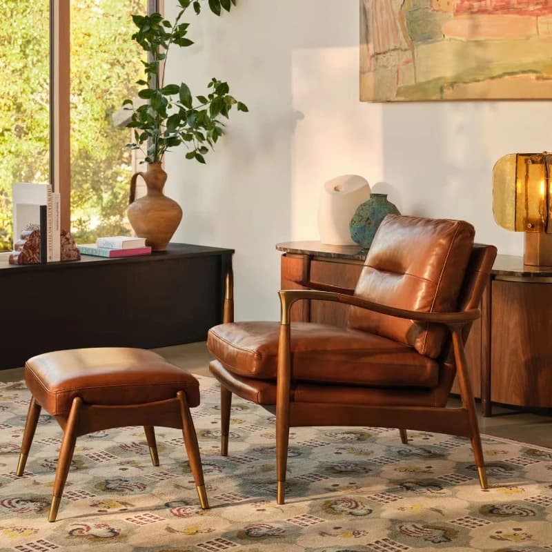 Handmade leather oak armchair with brass feet and footstool