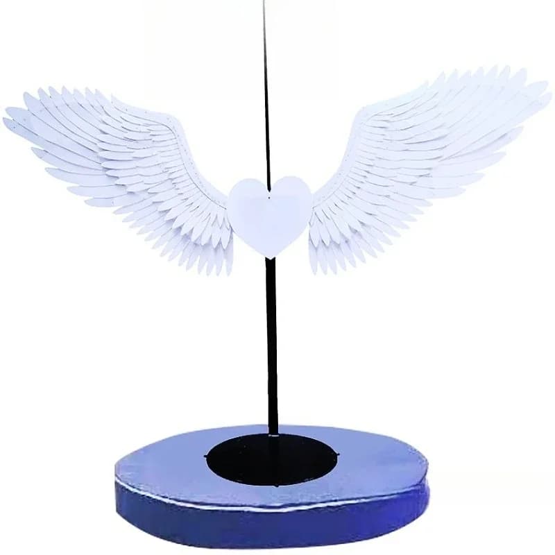 Led glowing wing clock in photo background wall decoration, ornament large wing