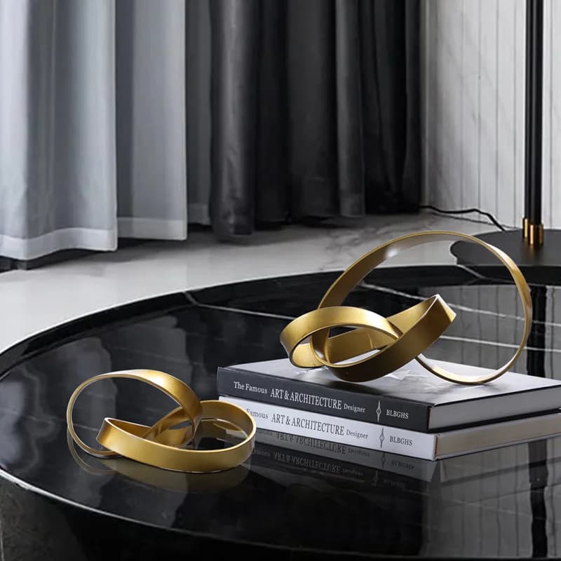 Modern simple European light luxury gold winding curved ornaments, study storage decorations in the sales office