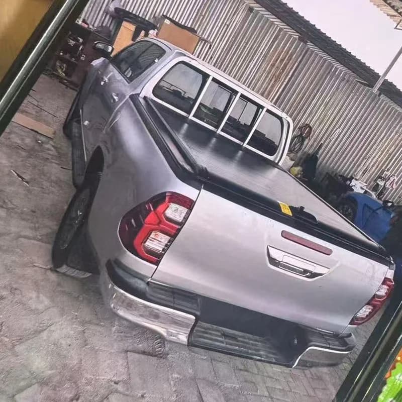 High Quality Hilux Waterproof Heavy Pickup Truck Bed Aluminum Le Hard Retractle Roll Up Tonneau Cover