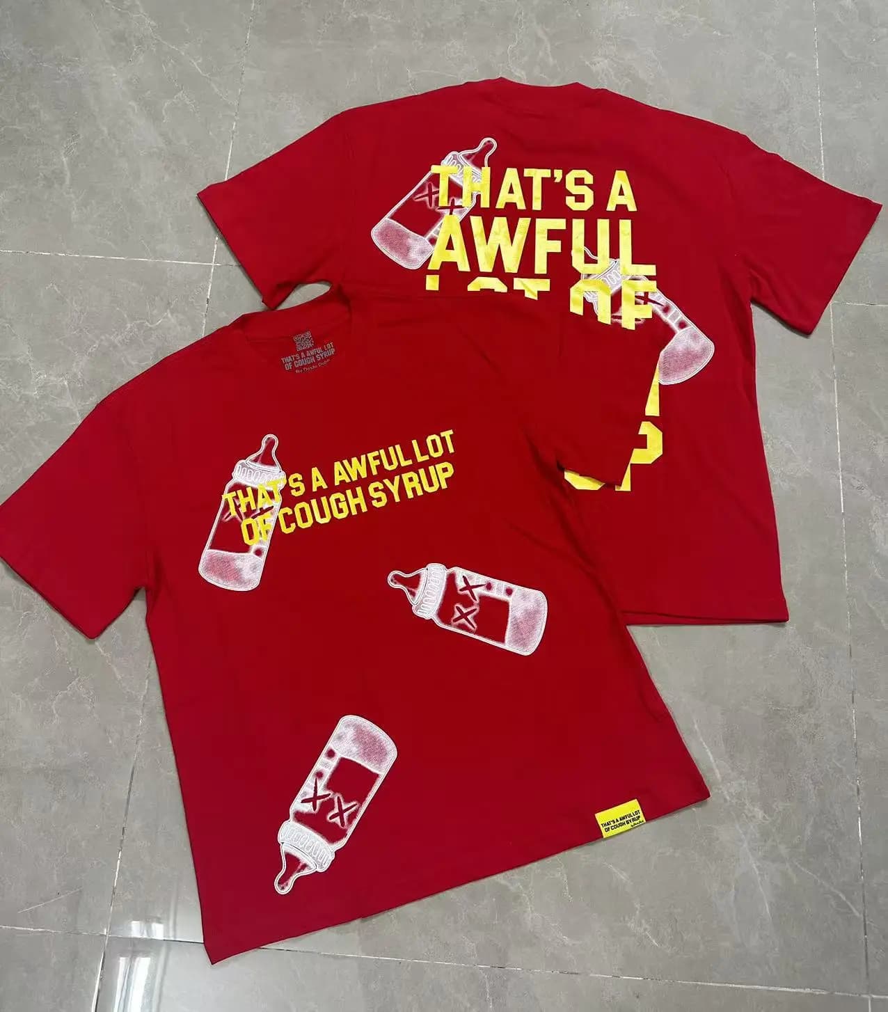 THAT'S A AWFUL LOT OF COUGH SYRUP Printed, loose-fitting men's and women's short-sleeved t-shirts