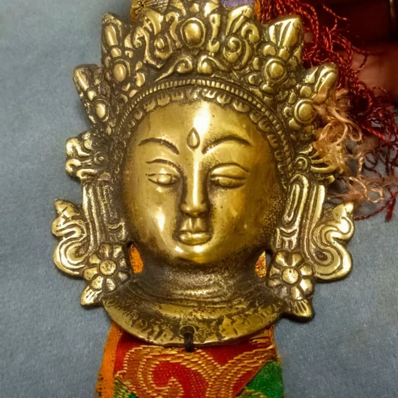 Antique miscellaneous items, distressed handicrafts, Tibetan-style vintage brass engraved with Green Tara, hand-sewn prayer flag