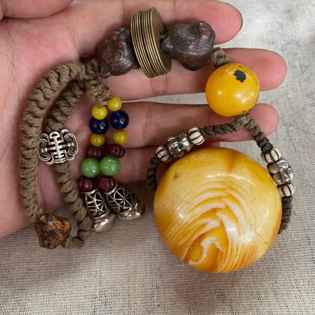 Antique beeswax bead pendant fine workmanship, good quality.
