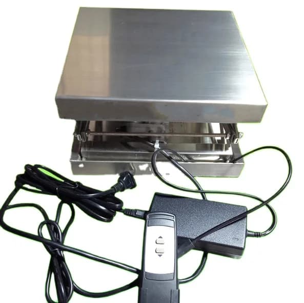 Small Electric Stainless Steel Scissor Lift 15KG Capacity Motor Core Remote Control Easy Operation For Chemical Equipment