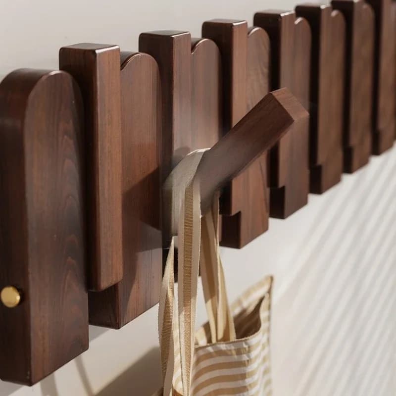 Piano keys on the wall hangers hangers at  entrance porch behind  door living room on  wall