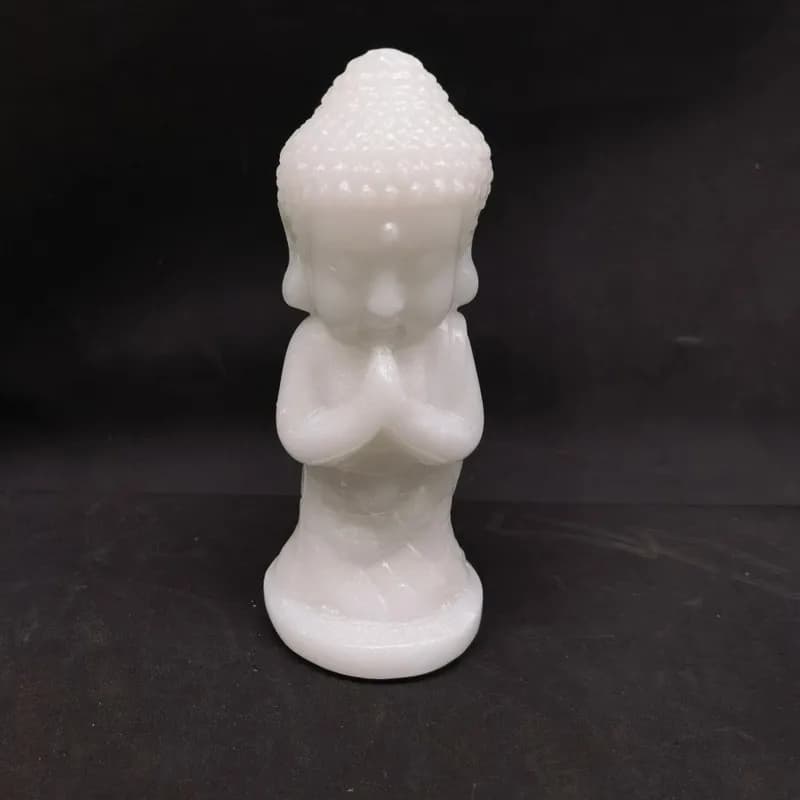 White marble baby Buddha Zen ornament for home worship, living room, and entrance decoration