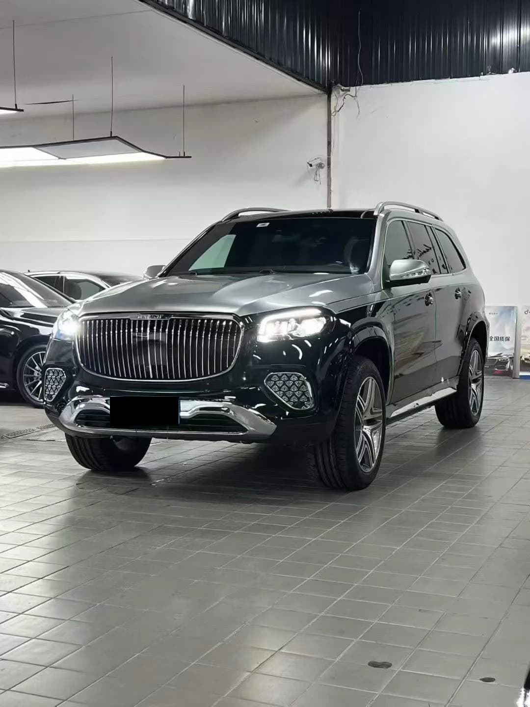 Body Kit for -Benz GL W166 to GLS W167 Model, Featuring a Bumper, Grille, Hood, Fenders, and Headlights.