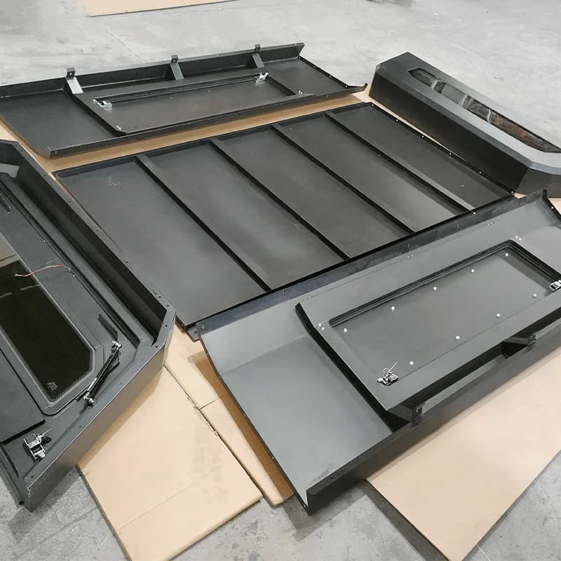 The  Raptor F350 Pickup Truck Has Been Modified with a Split Iron Three-door High Lidcanopy and a Tail Lid