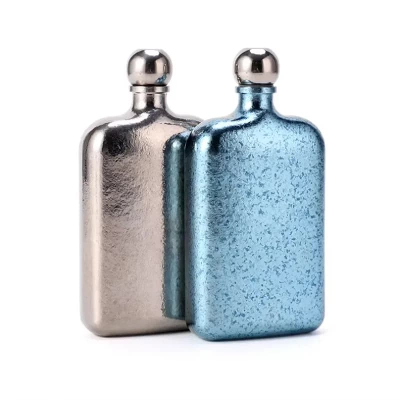Titanium whisky flasks and bottles