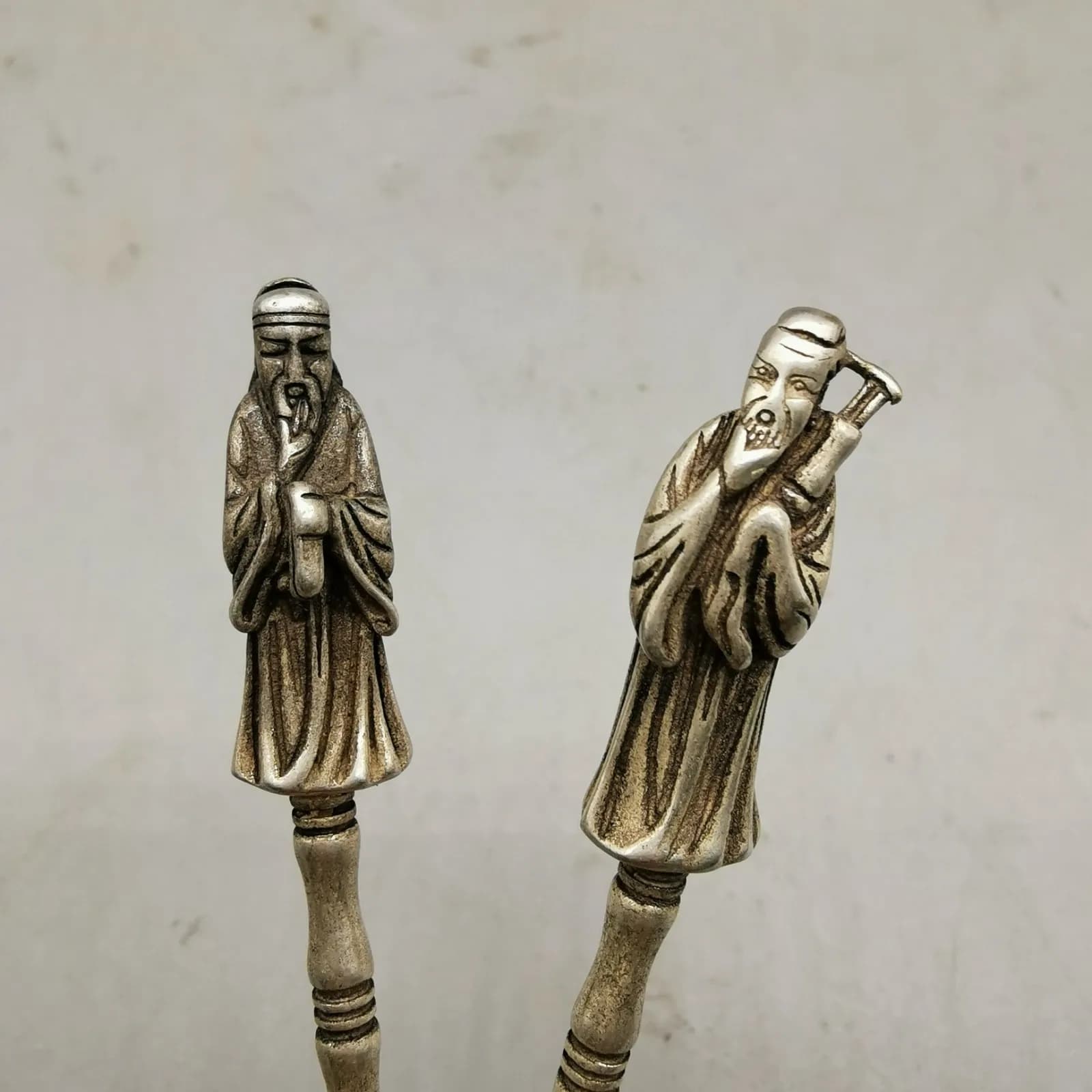 A set of Tibetan silver Eight Immortals spoons