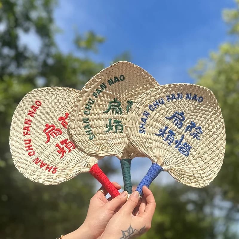 Summer handmade old-fashioned sunflower fan straw woven hand-cranked Zongye group  printed banana Pu fan logo embroidery