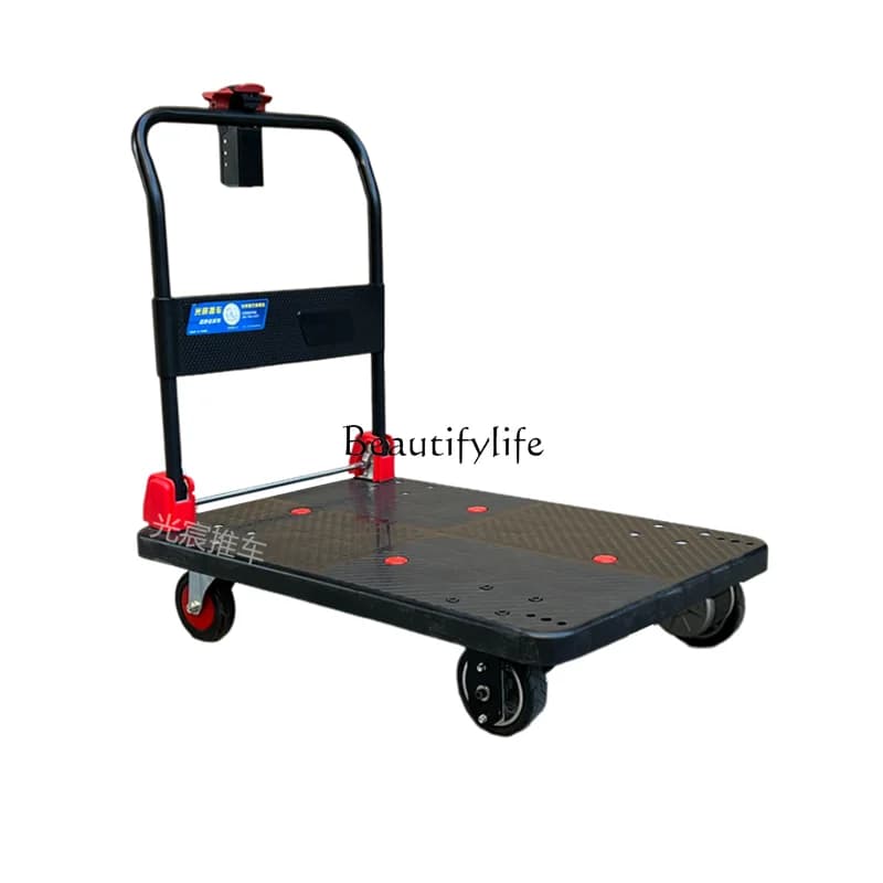 1Electric flatbed cart trolley pulling goods small into the elevator trolley